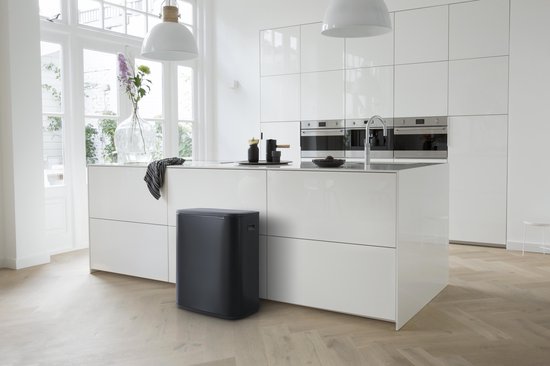 Brabantia Bo Touch Bin black 60-liter trash can in modern white kitchen