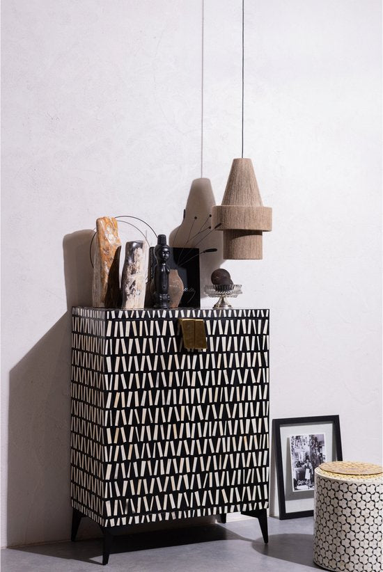 WOOOD Neva side table with black and white geometric bone inlay pattern and storage items on top