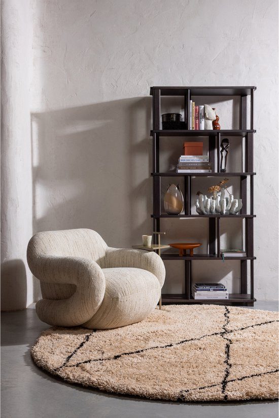 Black metal five-shelf bookcase with glass doors and wood shelves styling books and decor