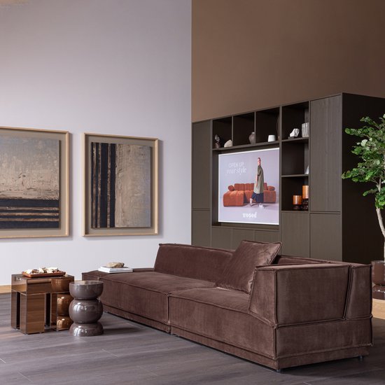 Brown upholstered sectional sofa with throw pillows and wooden legs